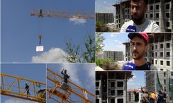 Ücretlerini alamayan işçilerden vinçli protesto